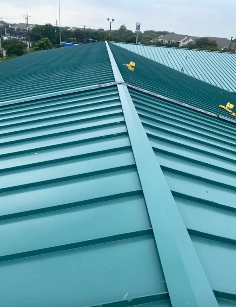 Green commercial metal roof ridge and valley for Metal Roof Repair in Fair Haven