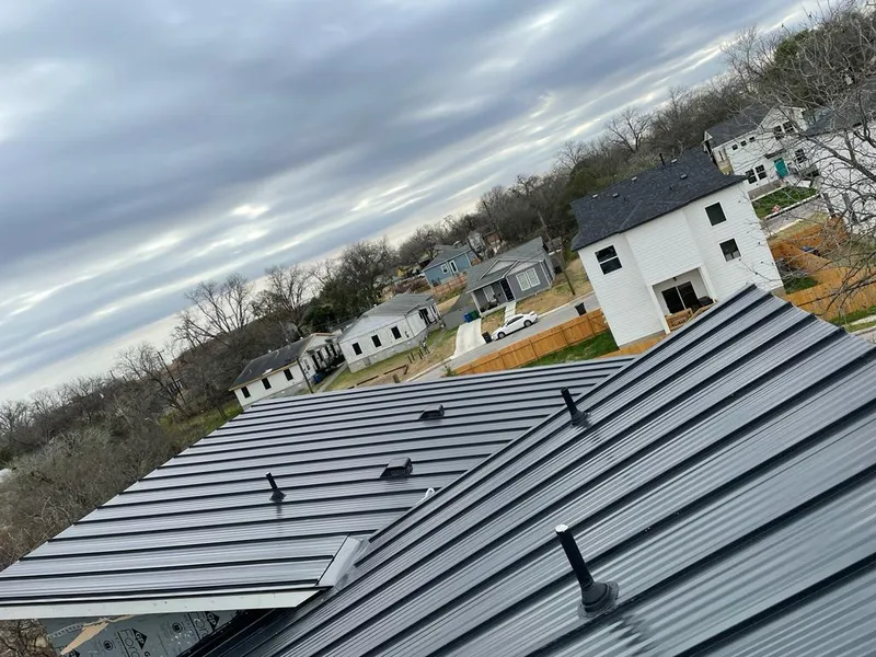 Standing seam metal roof panels with vents for Skylight Repair in Fair Haven